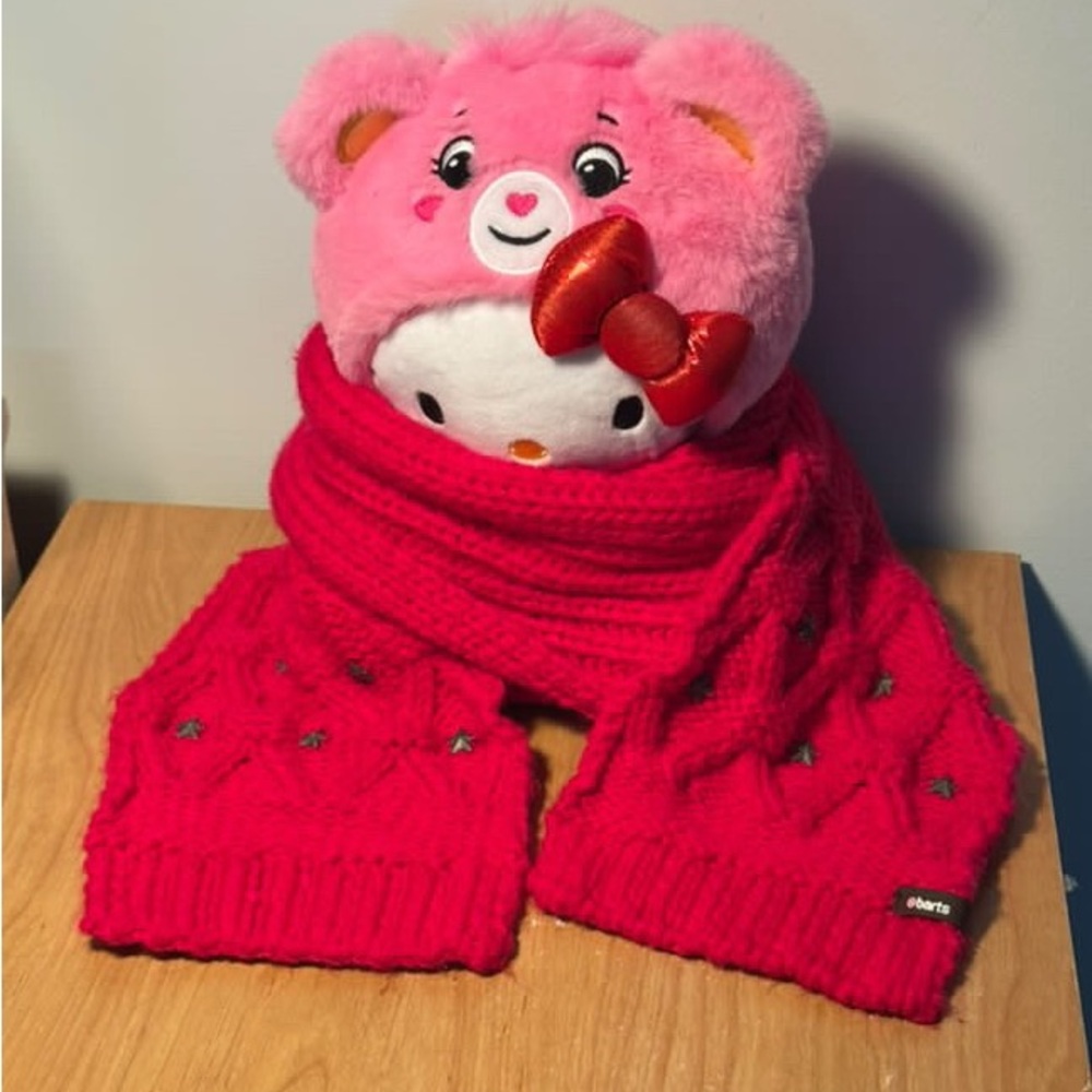 🛍️ Hot pink chunky knit scarf with metal star embellishments by Barts.